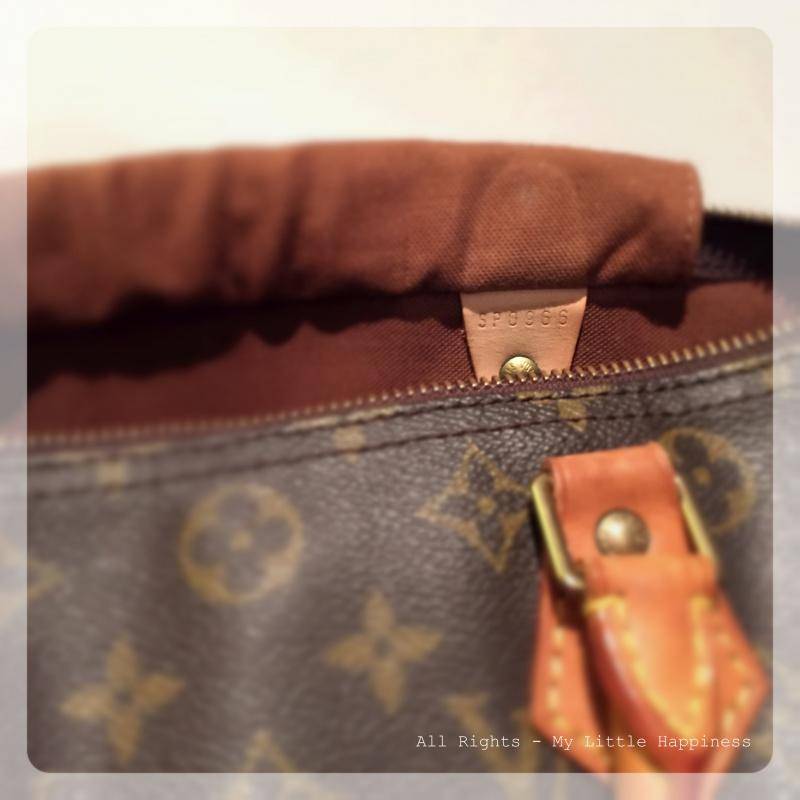 Designer vintage tas LV binnenkant